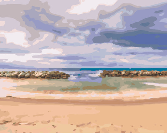 Horizontal shot of a beautiful beach with rocks