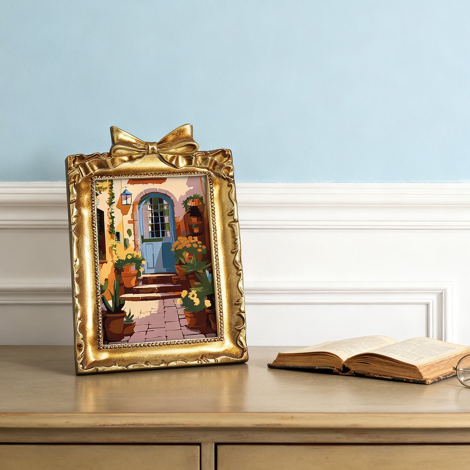 Framed mini paint by numbers of a charming garden door surrounded by lush flowers and greenery