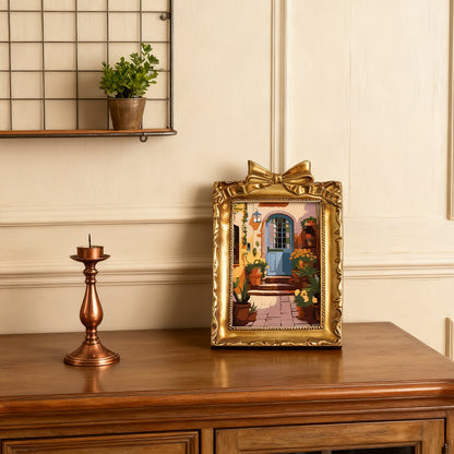 Framed mini paint by numbers of a charming garden door surrounded by lush flowers and greenery