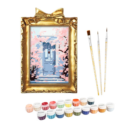 Kyoto Cherry Blossoms framed mini paint by numbers featuring sakuras over a blue doorway