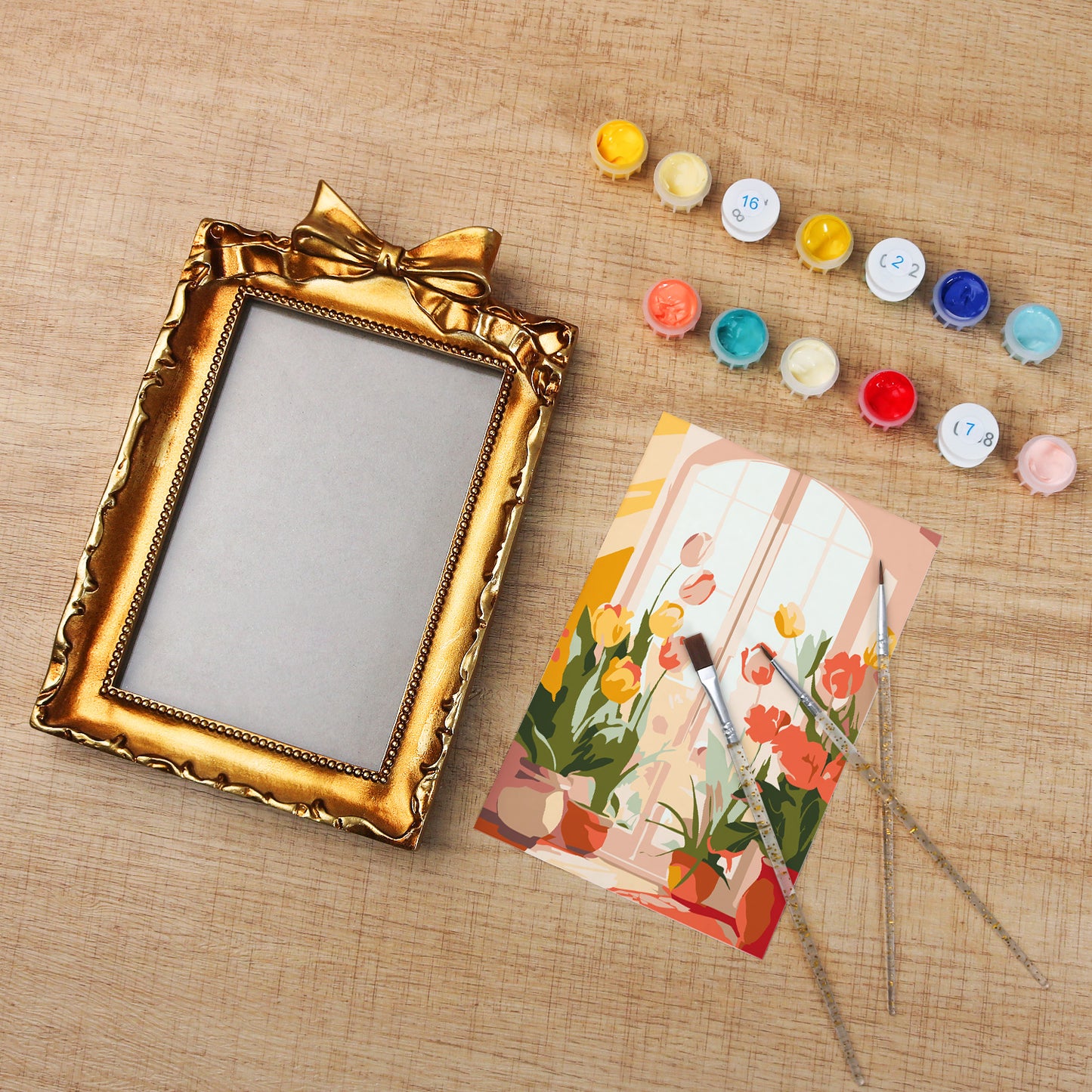 Framed mini paint by numbers of a cozy window filled with blooming flowers and warm decorative details
