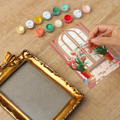 Framed mini paint by numbers featuring a window garden filled with colorful tulips and bright floral accents