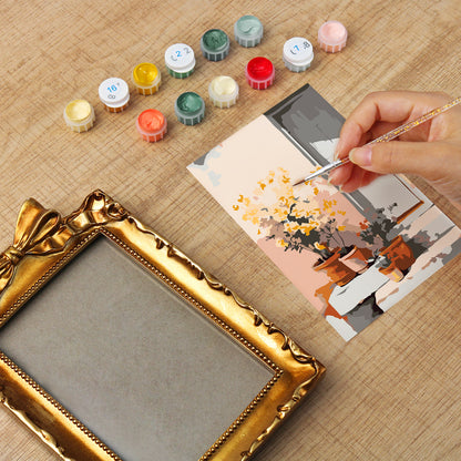 Framed mini paint by numbers of a sunlit indoor plant corner with greenery and natural light