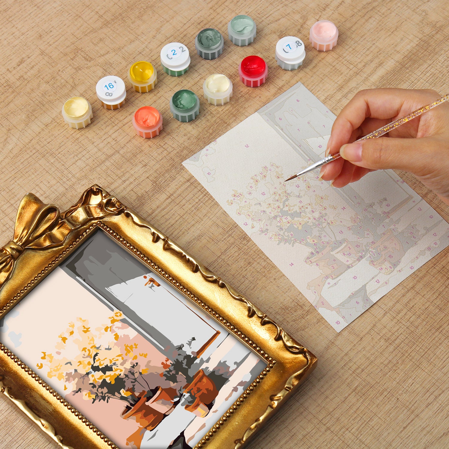 Framed mini paint by numbers of a sunlit indoor plant corner with greenery and natural light