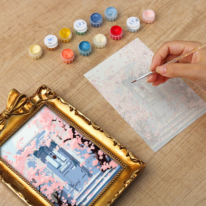 Kyoto Cherry Blossoms framed mini paint by numbers featuring sakuras over a blue doorway