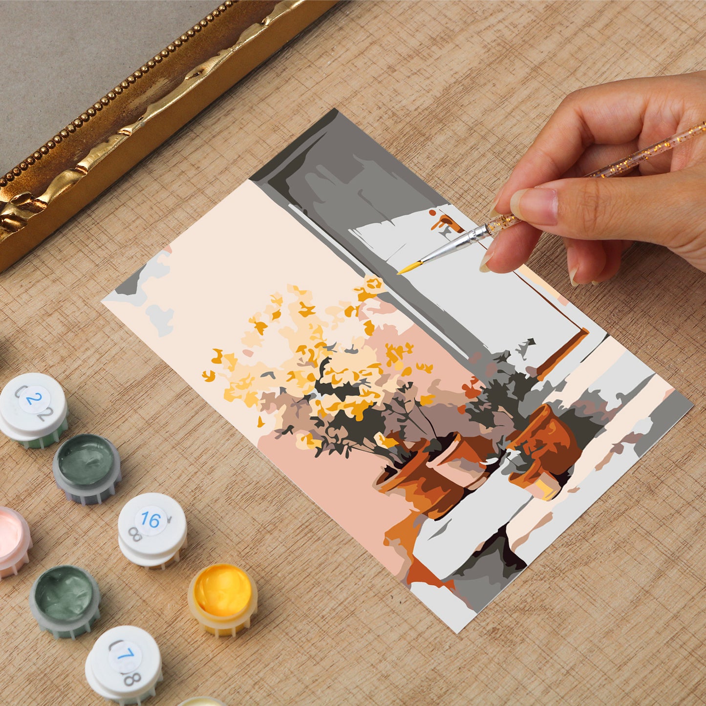 Framed mini paint by numbers of a sunlit indoor plant corner with greenery and natural light