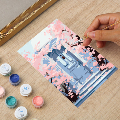 Kyoto Cherry Blossoms framed mini paint by numbers featuring sakuras over a blue doorway