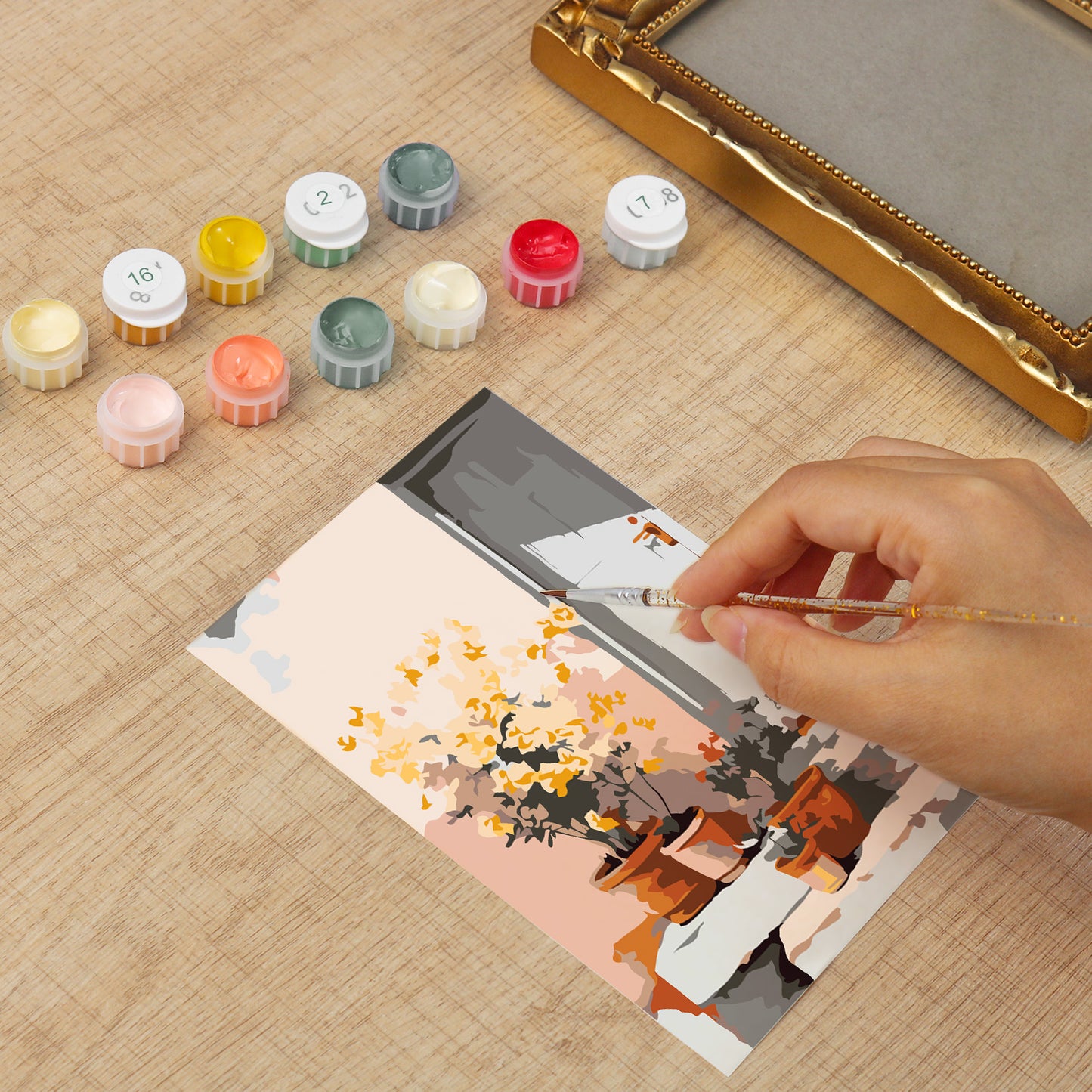 Framed mini paint by numbers of a sunlit indoor plant corner with greenery and natural light