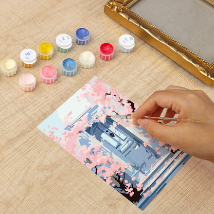 Kyoto Cherry Blossoms framed mini paint by numbers featuring sakuras over a blue doorway