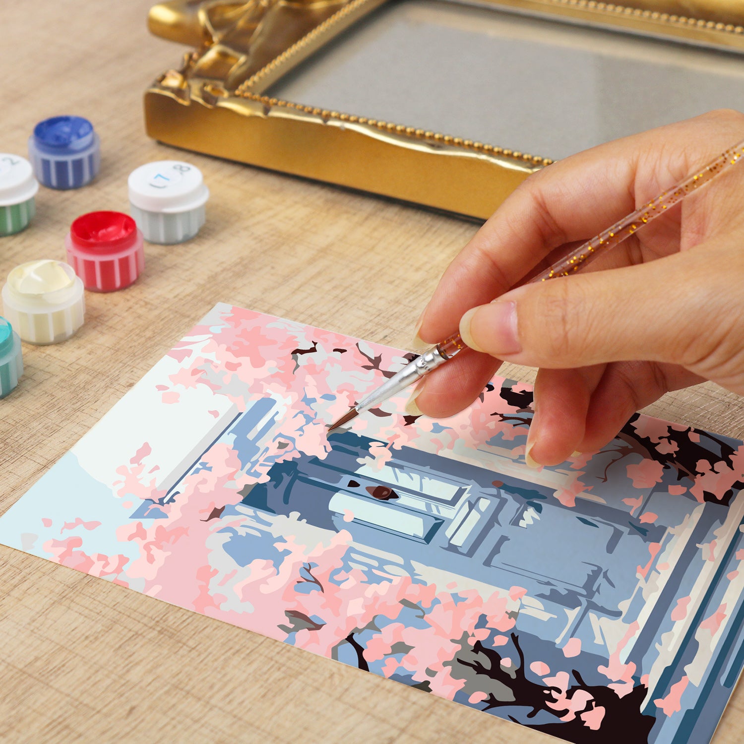 Kyoto Cherry Blossoms framed mini paint by numbers featuring sakuras over a blue doorway