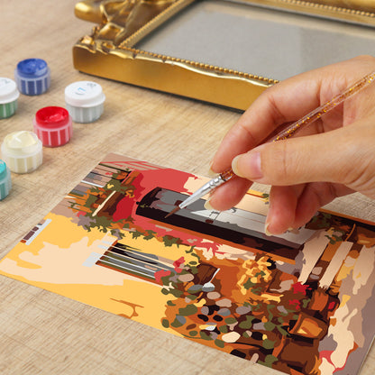 Framed mini paint by numbers showing a Mediterranean passage filled with vibrant flowers and decorative details