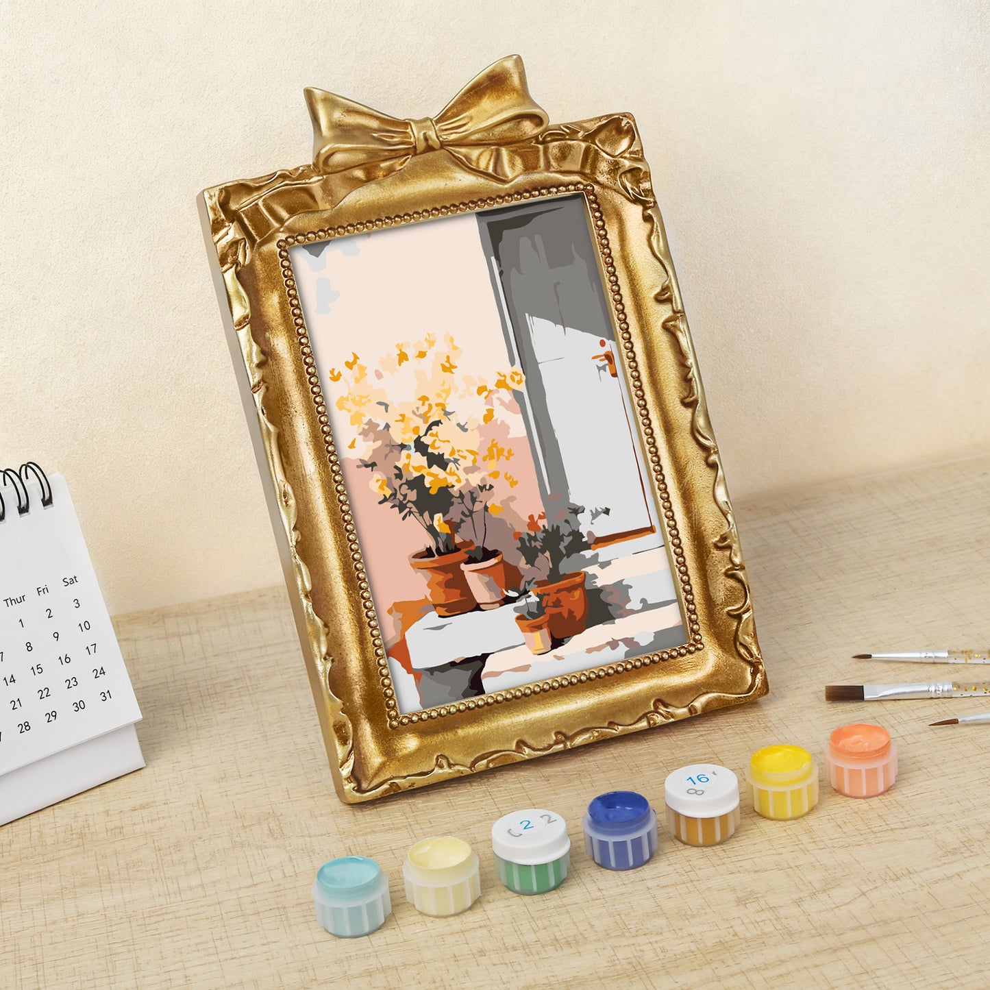 Framed mini paint by numbers of a sunlit indoor plant corner with greenery and natural light