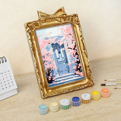 Kyoto Cherry Blossoms framed mini paint by numbers featuring sakuras over a blue doorway