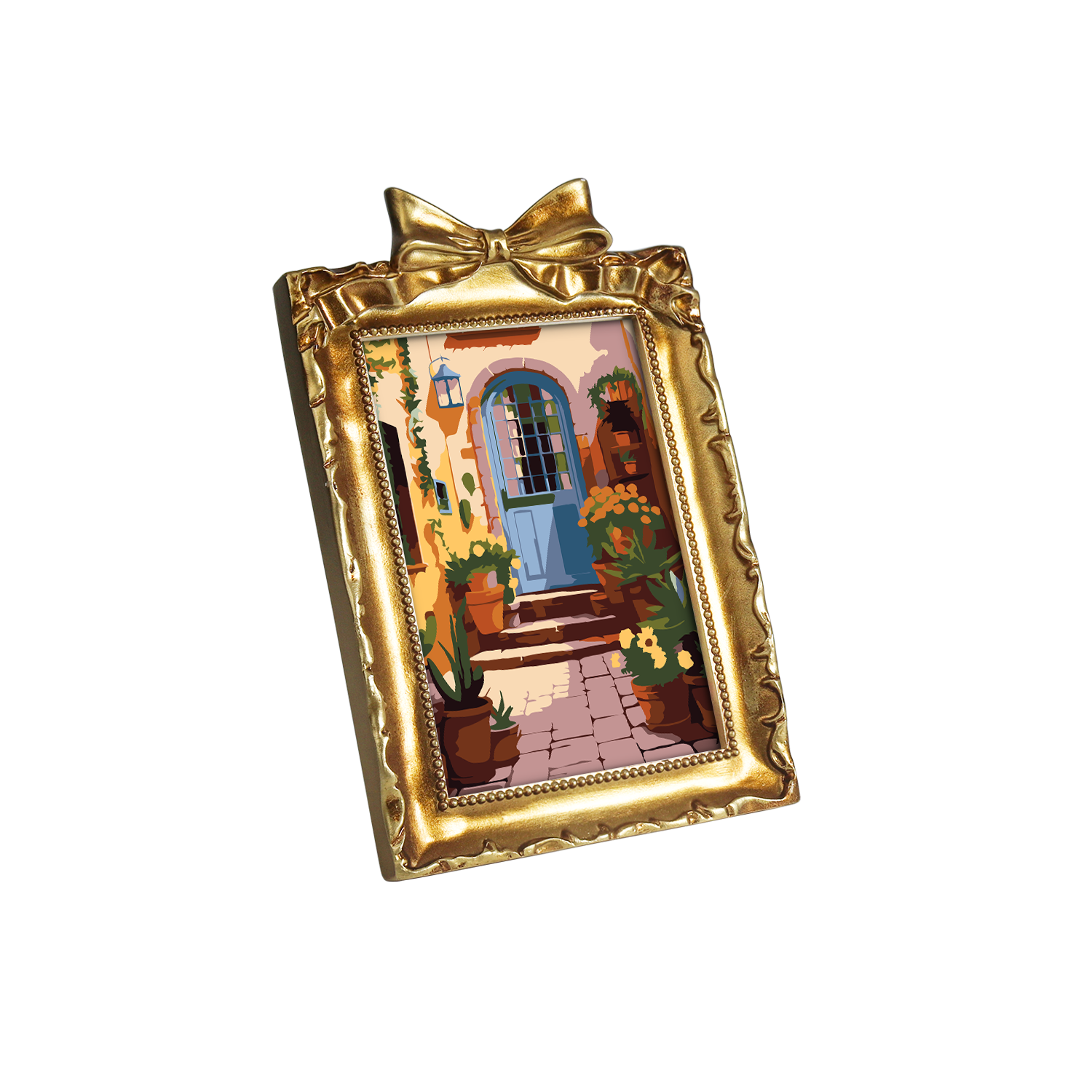 Framed mini paint by numbers of a charming garden door surrounded by lush flowers and greenery